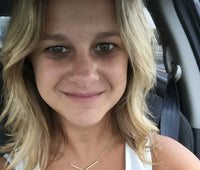 Kristin Candelore, girl smiling in a car selfie