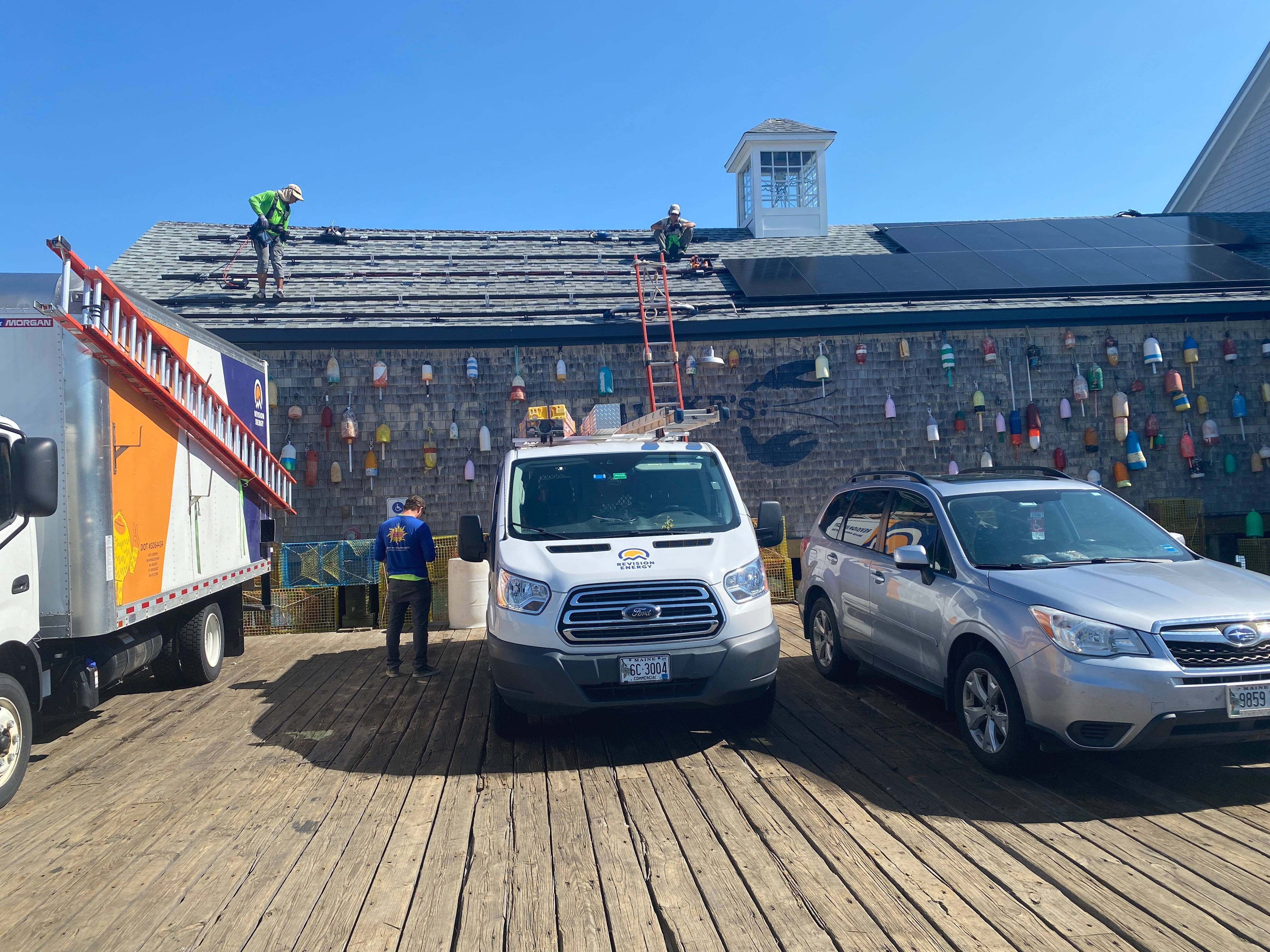 solar panels being installed at portland pier restaurant 