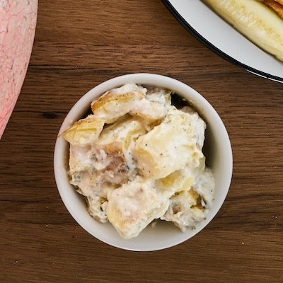 Potato salad in a white dish