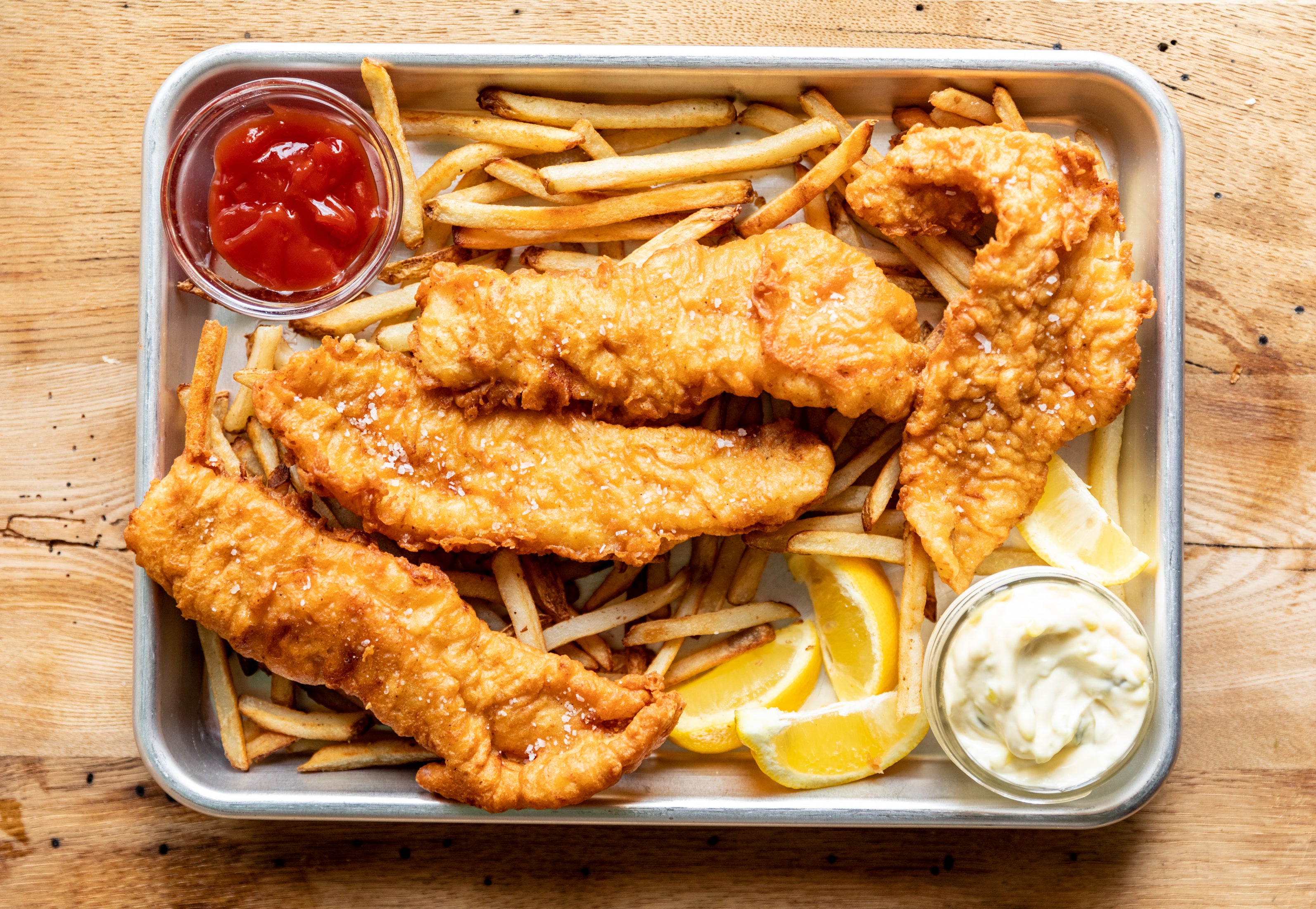 A man holding up a very large fish