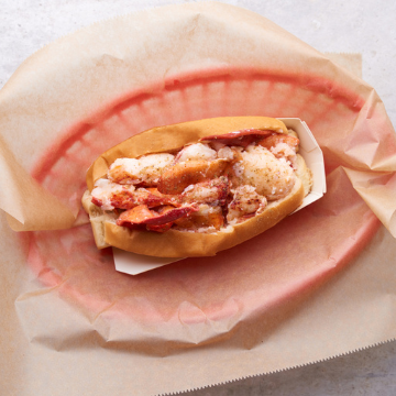 Lobster Roll in a red basket lined with wax paper